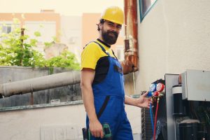 Mechanic looking at refrigerant levels